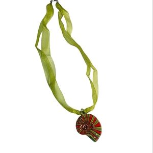 Hand blown green and orange striped glass shell pendant on organza chain